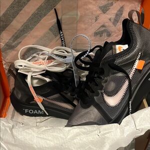 THE 10: Nike zoom Fly. Black and White Sneakers with Orange Accents